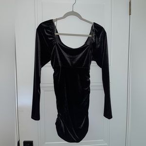Bodycon velvet long-sleeve dress.